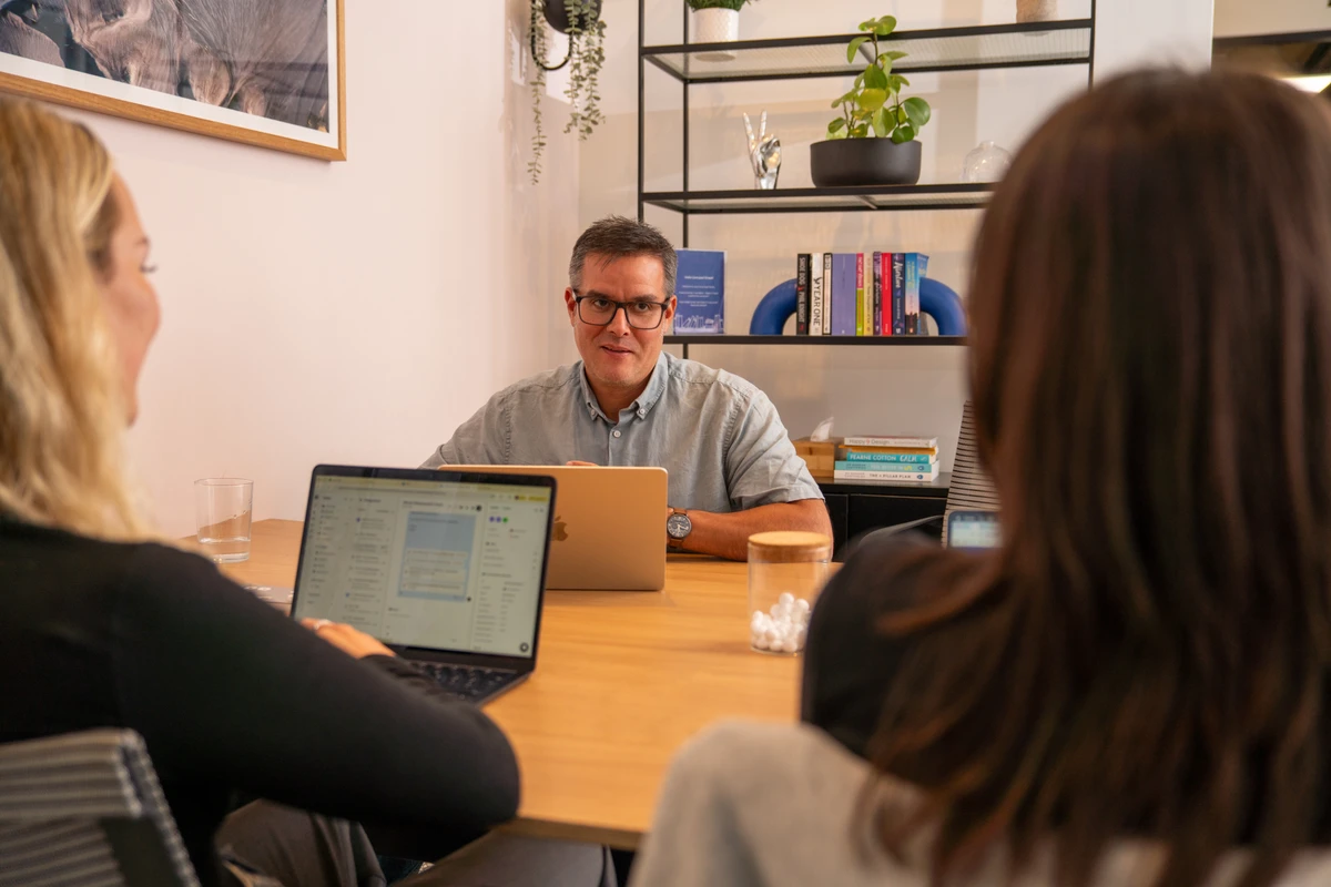 A Geckoboard team member talking through a bespoke data project during a meeting